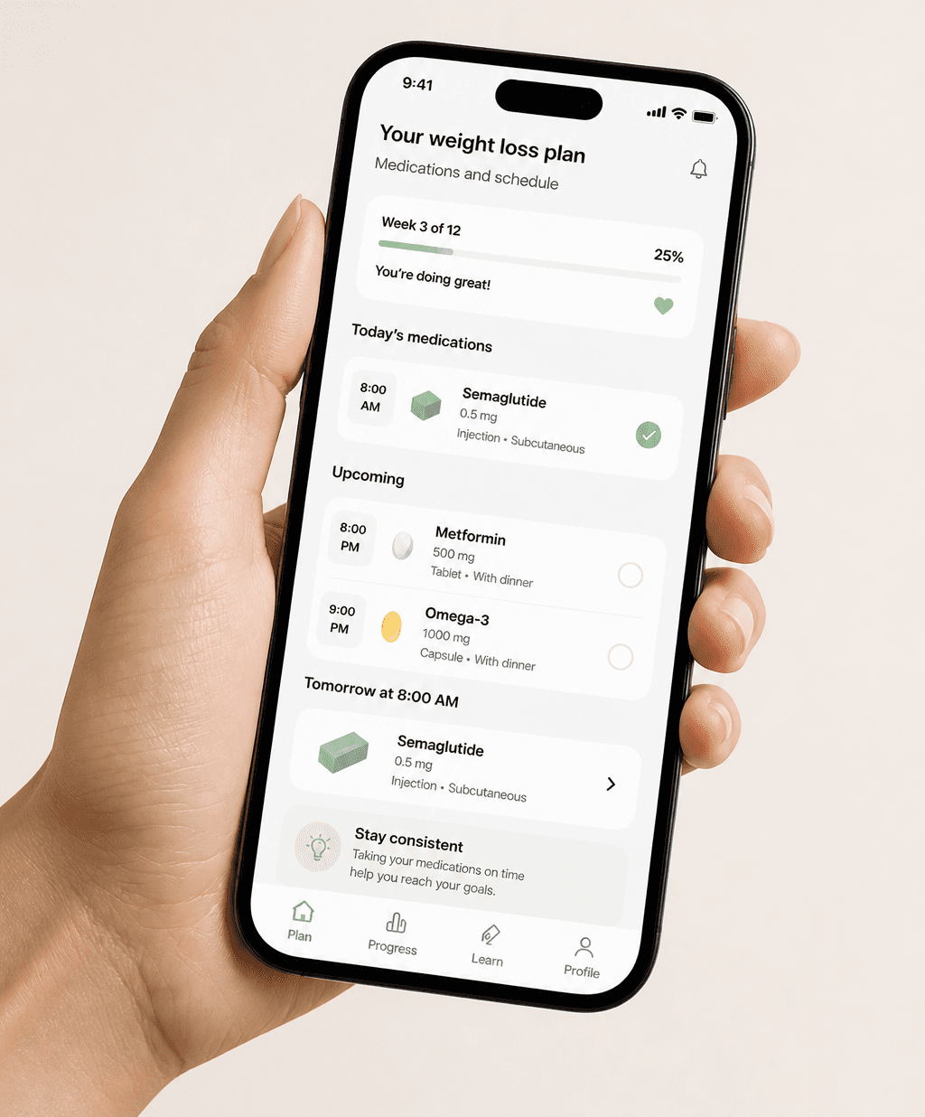 Phone showing the Auria weight-loss plan and medication schedule